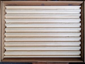Cardboard box with 11 wooden grooves for increment cores